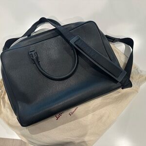 Guaranteed authentic unused black Ferragamo crossbody leather travel briefcase